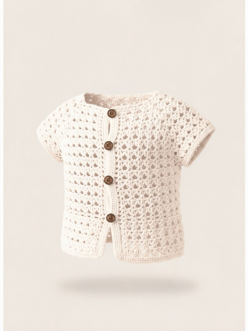 The Little One Sweater in white — handmade crochet baby cardigan