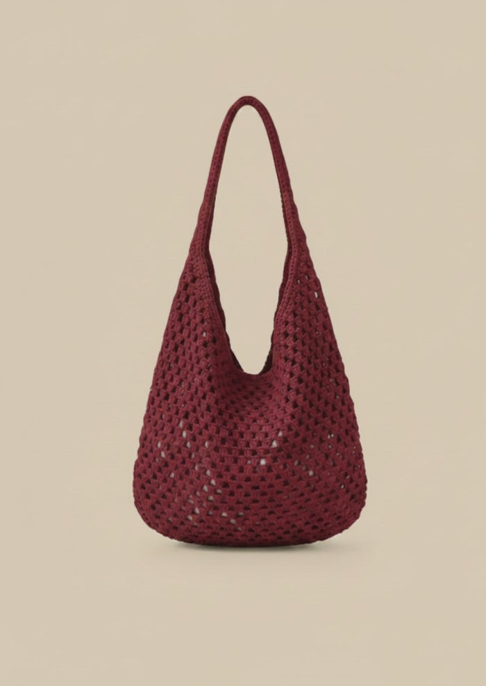 The Market Bag in deep red — handmade open-mesh crochet tote